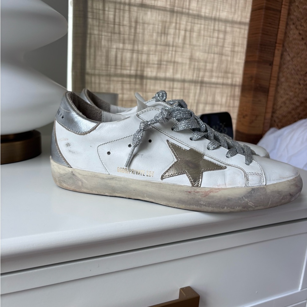 Golden Goose Superstar with gold star and silver heel and laces